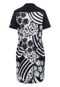 Robe polo noir et blanc avec des motifs floraux et léopard, ornée de rayures horizontales. Inclut un accent vert le long de l'encolure.