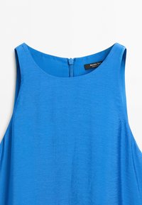 Blue sleeveless dress with round neckline and back zipper, showing top portion and clothing tag inside collar.