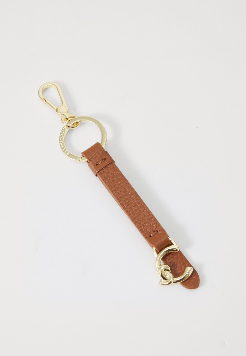 Sangle de porte-clés en cuir texturé brun avec un anneau en or et un fermoir. Comprend une boucle décorative en or. Design simple et fonctionnel.