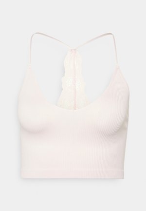 Jasnoróżowy prążkowany biustonosz bez fiszbin z koronkowym wykończeniem na plecach i cienkimi regulowanymi ramiączkami.