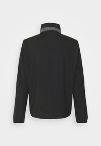 Tommy Hilfiger Giacca leggera - black