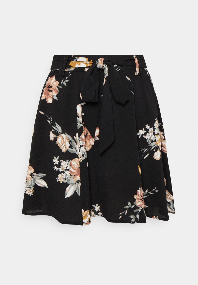 Jupe noire ligne A avec imprimé floral pêche et blanc, dotée d'une ceinture en tissu nouée en nœud à la taille et de passants pour ceinture.