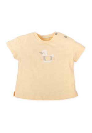 Camiseta de bebé de color amarillo claro con mangas cortas, dos botones en el hombro y un pato con flotador bordado en el frente.