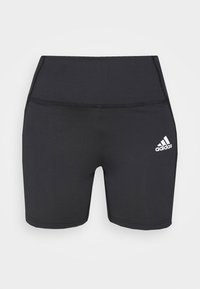 Černé atletické šortky z elastické látky s vysokým pasem, hladkou texturou a bílým logem Adidas na spodní přední straně.