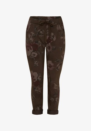 Brune blomsterprint bukser med afslappet pasform, elastisk talje og justerbar snøre. Manchetter ved buksebenene og tekstureret stofdetalje.