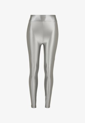 Colanți argintii cu talie înaltă, confecționați dintr-un material neted și strălucitor. Designul strâmt evidențiază o siluetă elegantă, fără modele vizibile.