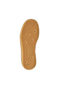 Schoenenzool met een gegroefd rubberen patroon in lichtbruin. Kenmerkt zich door ronde en zigzagtexturen, gemarkeerd met "SKECHERS."