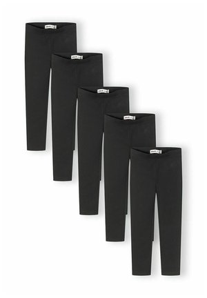 Cinq paires de leggings noirs disposées en diagonale descendante sur un fond blanc.