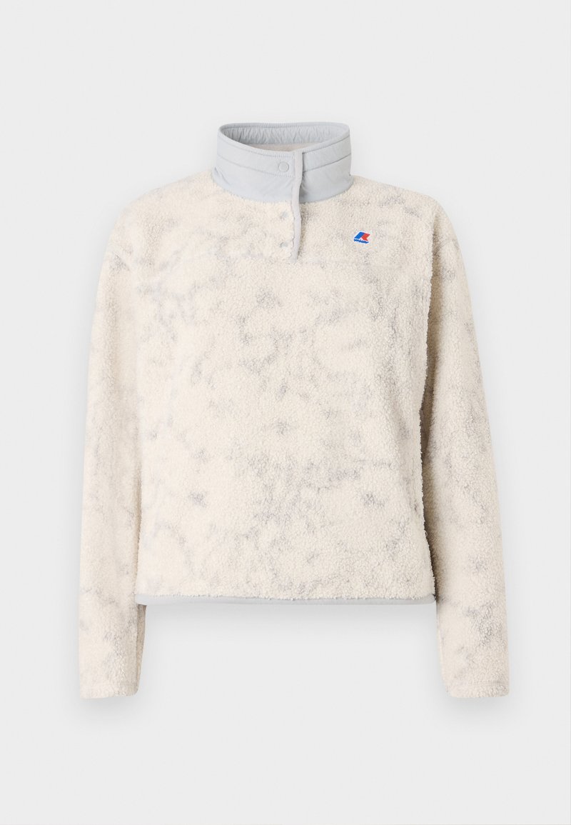 Fleece pullover in off-white with a textured surface, gray collar, snap closure, and small logo detail on the chest.