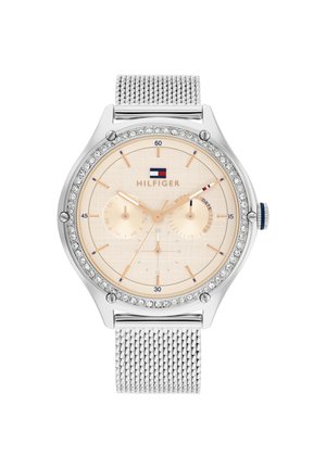 Silberner Mesh-Armbanduhr mit champagnerfarbenem Zifferblatt, mit Kristallen verziertem Gehäuse, zwei Subdials und blauen sowie goldenen Stundenmarkierungen. Logo auf 12 Uhr.