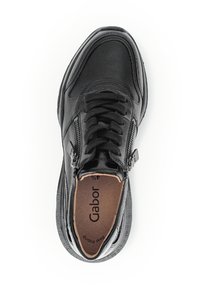 Black leather sneaker with textured accents, lace-up front, side zipper, and cushioned insole featuring the brand name "Gabor."