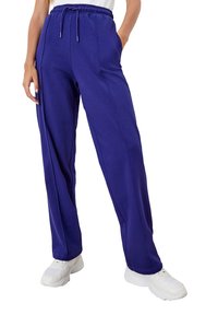 QS JOG MIT ZIERNAHT - Jogginghose - ozeanblau