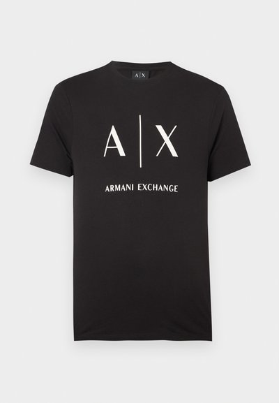 T-shirt en coton noir avec les initiales "A|X" et "ARMANI EXCHANGE" imprimées en blanc. Col rond avec manches courtes.