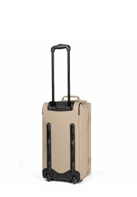 Valigia in tessuto beige con manico telescopico estensibile nero, due ruote e una maniglia per il trasporto in tessuto su sfondo bianco.