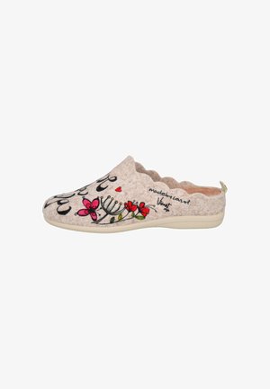 Zapatilla deslizante beige con bordes ondulados, que presenta un bordado floral colorido y texto en cursiva en el lateral y la parte superior.