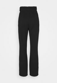 Pantalon noir taille haute avec une texture lisse, coupe droite et taille élastique. Aucun motif ou accent visible.
