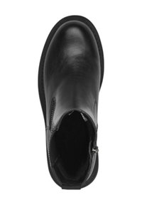 Bottine en cuir noir avec un bout rond, texture lisse, fermeture éclair latérale et détails cousus sur le bord supérieur. Semelle avec une légère semelle antidérapante.