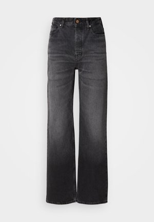 Jeans neri a zampa d'elefante con vita alta, cinque tasche, chiusura a bottone e un leggero effetto sbiadito. Tessuto spesso con una vestibilità strutturata.