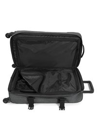 Gray wheeled suitcase with a black interior, featuring a spacious main compartment and a zippered pocket for organization.