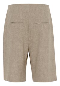 Light beige shorts made of textured fabric, featuring two back pockets, straight cut legs, and a waistband with no visible closures.
