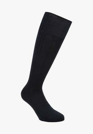Calcetines negros hasta la rodilla, hechos de una tela acanalada, con una textura suave y un puño reforzado para un ajuste seguro.