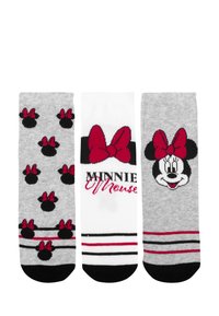 Tre paia di calze: a sinistra grigia con teste di Minnie Mouse nere; al centro bianche con fiocchi rossi e "Minnie Mouse"; a destra grigia con il viso di Minnie.
