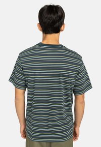 Short-sleeve, crew-neck t-shirt featuring a dark blue background with horizontal stripes in green and yellow. Soft cotton material.