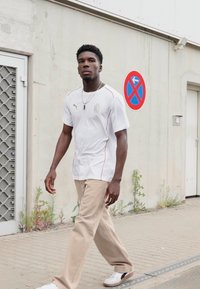 Puma AC MILAN CASUALS TEE - Sports T-shirts - white/red