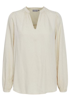 Cremfarbene Bluse mit V-Ausschnitt, langen Ärmeln mit gerafften Manschetten und einem texturierten Muster. Weicher, leichter Stoff.