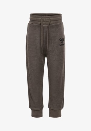 Braune Sweatpants mit strukturierter Oberfläche, elastischem Bund, Kordelzug und Logodetail am linken Oberschenkel. An den Knöcheln gerippt.