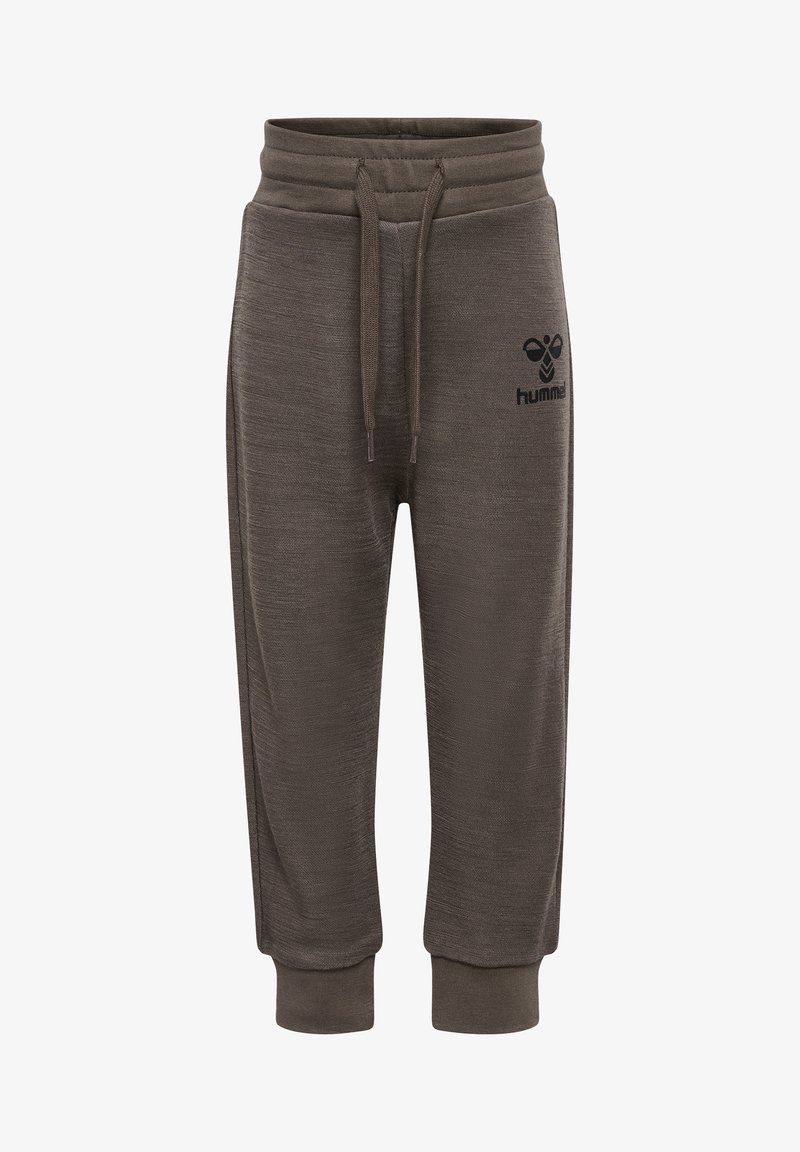 Bruna sweatpants med en texturerad yta, elastisk midja, dragsko och logodetalj på vänster lår. Med mudd vid anklarna.