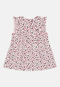 Abito bianco con maniche corte arricciate, caratterizzato da una stampa di ciliegie rosse e verdi. Vita elastica e chiusura con bottone sul retro. Tessuto leggero.