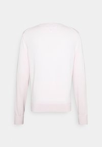 Ljusrosa sweatshirt med långa ärmar, rund halsringning och ribbade muddar. Mjuk textur och enkel design; baksidan visar inga ytterligare detaljer.