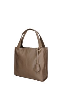 Bruine leren totebag met twee handvaten, gestructureerd oppervlak en een decoratieve leren kwast aan de zijkant. Doosvorm met een ruime binnenkant.