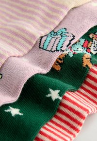 Four pairs of colorful socks: pink striped, green with patterns, red striped, and pink with a gift design. All are knitted with soft fabric.