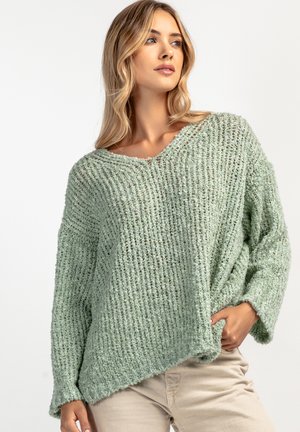 - Sweter