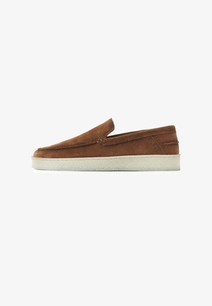 Brown suede slip-on shoe with white rubber sole, visible stitching, and subtle side branding on a plain white background.
