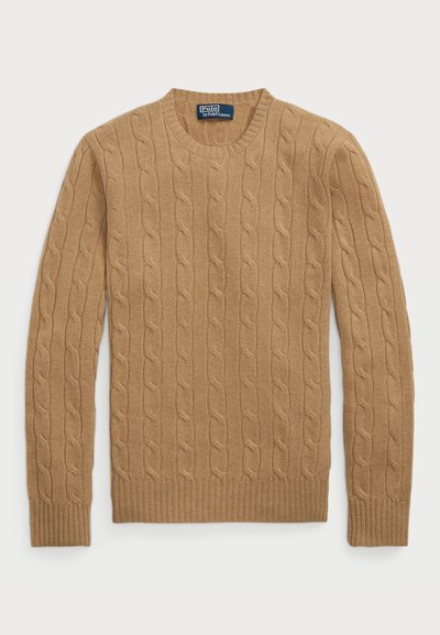 Κασκόλ σε καμηλό χρώμα, με στρογγυλή λαιμαριά, ριμπ μανσέτες και στρίφωμα, καθώς και υφασμάτινο σχέδιο σε όλο το σώμα.