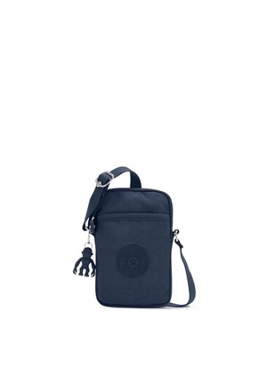 Navy blue crossbody bag made of durable fabric with a front pocket, circular logo detail, and a monkey-shaped zipper pull. Adjustable strap.