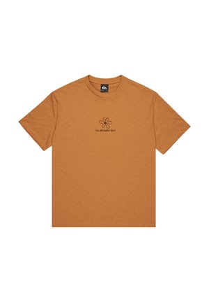 Rust-colored short-sleeve t-shirt with a small black flower-like logo and "Quiksilver" text centered on the chest.