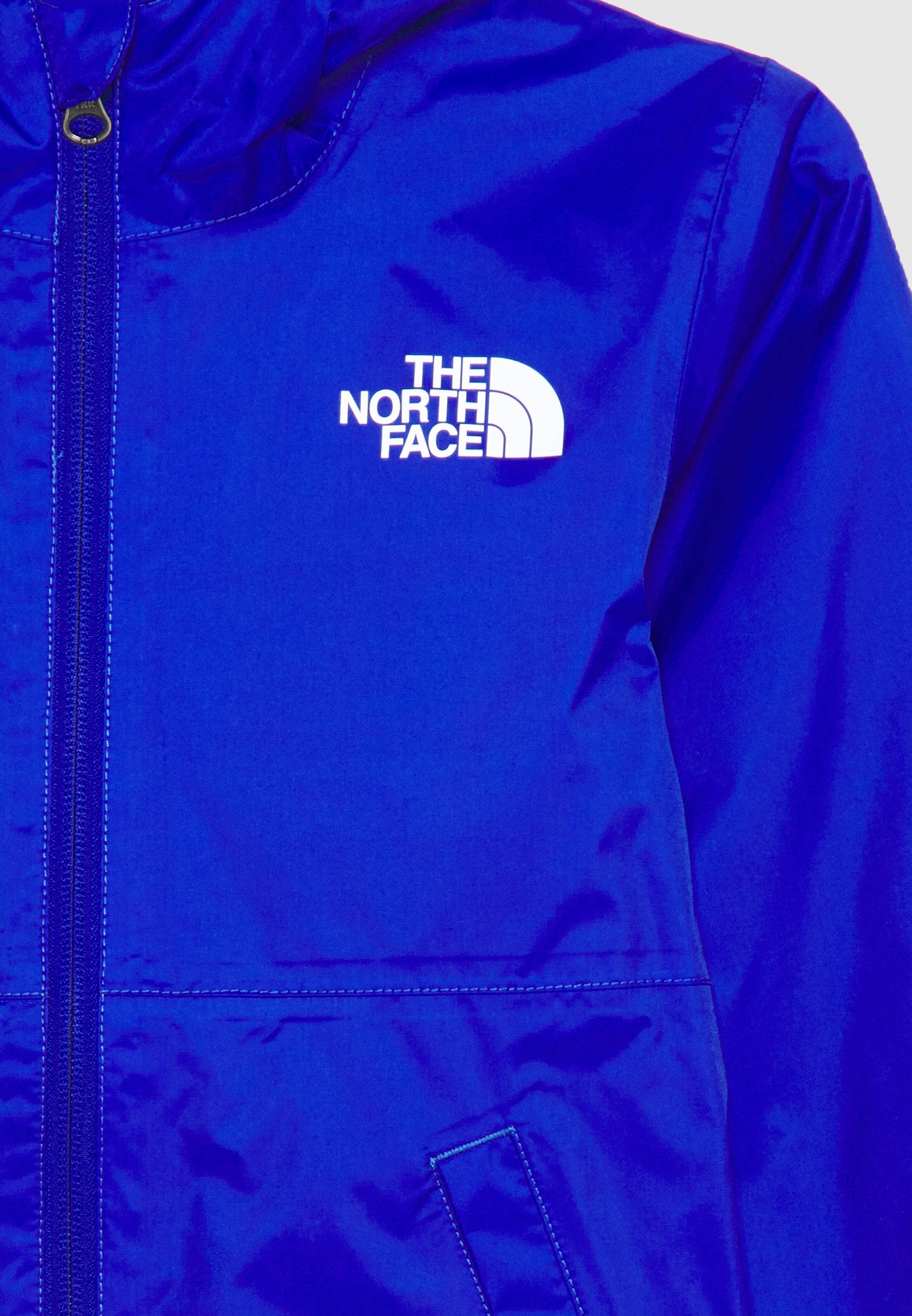 blue north face rain jacket
