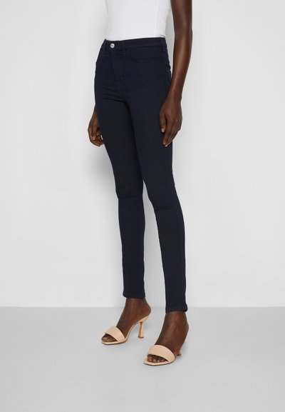Filippa K LOLA SUPER STRETCH - Calças de ganga de corte skinny - mid dark denim