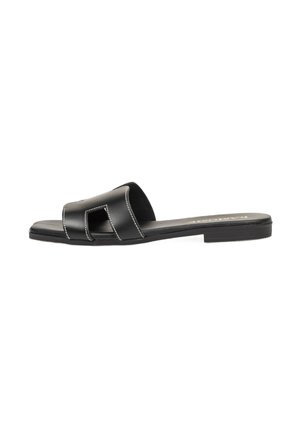 ALAIA - Sandalias planas - black