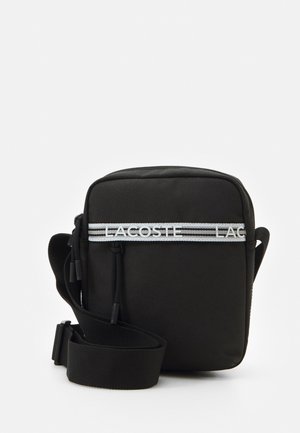 Lacoste NEOCROC SEASONAL UNISEX - Bandolera - noir blanc