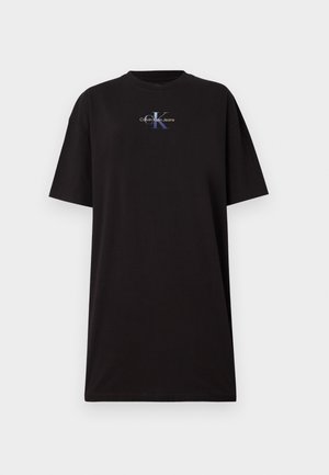 Zwart oversized T-shirt met korte mouwen met klein Calvin Klein Jeans-logo in blauw en wit, gecentreerd op de borst.