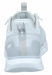 White sports sneaker with mesh and synthetic upper, padded collar, loop on heel, and textured sole. Features logo in subtle gray.