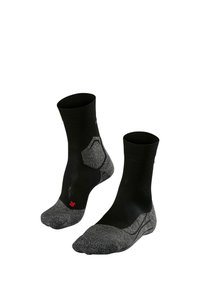 Calze sportive nere con accenti grigi, dotate di punte rinforzate e tessuto traspirante, progettate per comfort e durata.