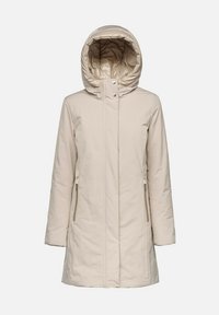 Manteau beige à capuche avec poches latérales zippées, doublure matelassée légère et coupe droite. Texture lisse et design minimaliste.