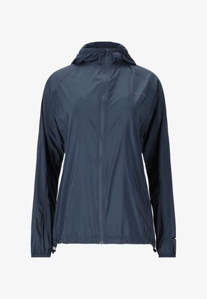 Marineblå letvægt hættejakke med fuld lynlås foran, lange ærmer, elastiske manchetter og justerbare snore i kanten.