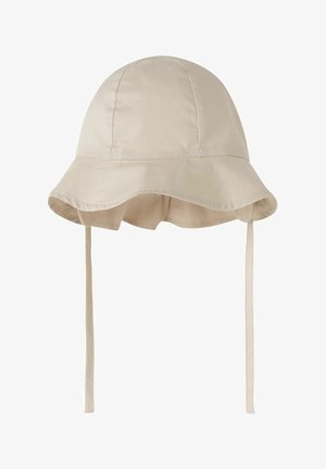 Beiger Baumwoll-Bucket-Hut mit breiter Krempe und langen Kinnriemen, entworfen für Sonnenschutz und sicheren Sitz.